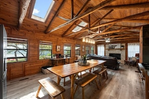 Share meals, laughter, and lake views around the oversized dining table with seating for 12. It's the perfect setting for family dinners, game nights, or reconnecting after a day on the water.