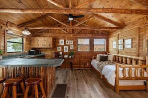 This private cabin is perfect for longer stays—includes a full kitchenette, microwave, and coffee bar for everything you need to feel at home.