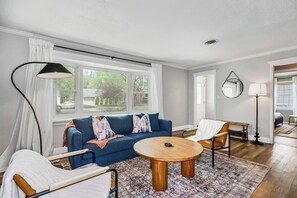 Sitting area with soft rug & natural light. 