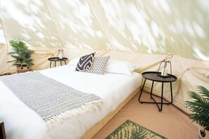 cozy mattress in our glamping tent