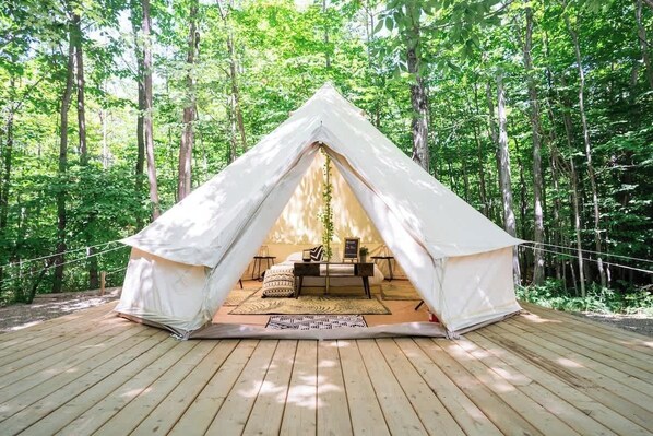 Glamping tent surrounded by nature