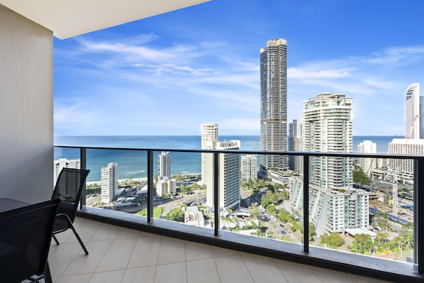 Enjoy your morning coffee in our spacious balcony overlooking the ocean/city