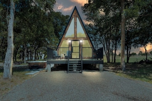 Beautiful A frame cabin that sits among trees close to Eagle Mountain Lake and Stockyards