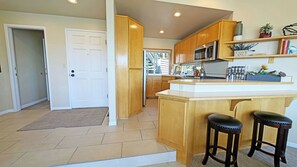 Just off the entrance is the Kitchen