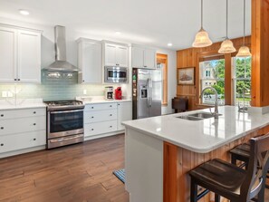 Whip up something delicious in the spacious Kitchen with lots of prep space!