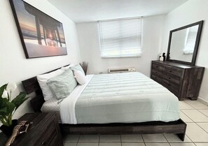 One of three bedrooms. This one has a queen-sized bed.