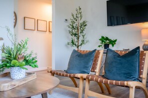Living room with comfortable chairs and pillows