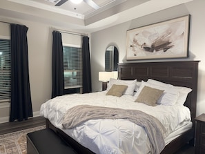 Sneak peek of the luxurious master bedroom, complete with a king bed and a touch of elegance. Professional pictures coming soon!