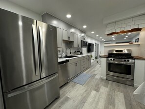 Enter the house into the kitchen