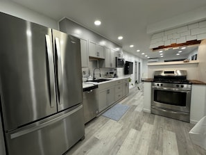 Enter the house into the kitchen