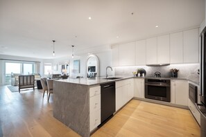 Modern Kitchen | Palms Postcard | 1006 Ocean Blvd, Dunescape 103, Isle of Palms, SC | IOP Escapes