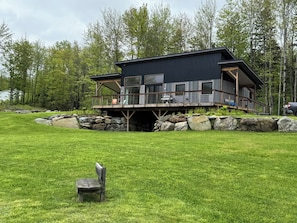 View of the back of the house with an oversided deck!