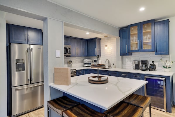 Fully updated and stocked kitchen. Coffee maker and tea kettle.