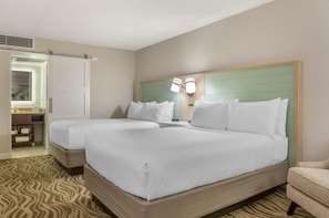 Unit with 2 Double beds. Exact unit will be assigned upon arrival. Views, colors, and decor may vary.