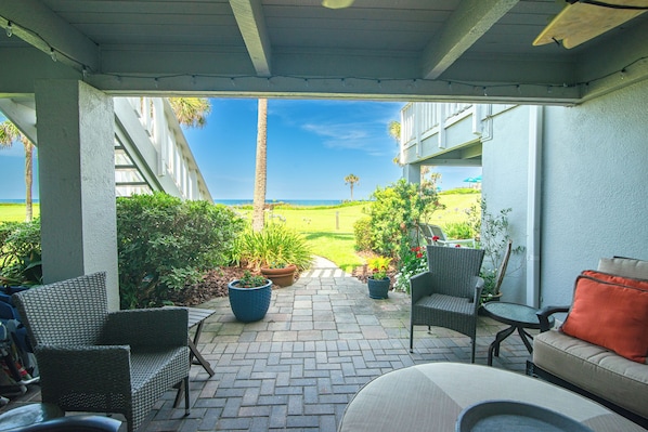 Beautiful covered spacious patio with a gorgeous view of the ocean.