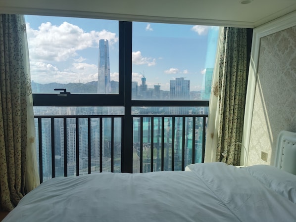 Master bedroom with city skyline views