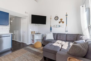 Curl up in the cozy living room & stream your favorites on the smart TV
