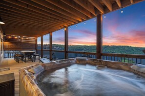 Bask in bubbling bliss in the lower-level deck’s hot tub
