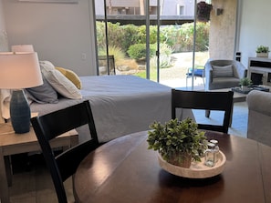 Sleeping and living areas - view from dining table, looking outside.