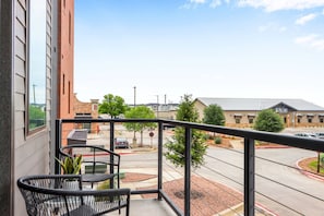 Sip morning coffee or an evening cocktail on the breezy balcony