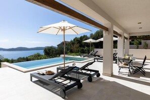 Terrace with a private pool