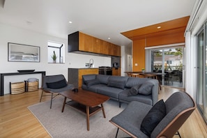 Living room tastefully appointed with mid-century modern vibe.