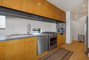 Food prep made easy with a chef's kitchen. Coffee bar for those needing a fix.