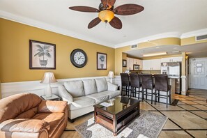 Living Room seating area facing Kitchen