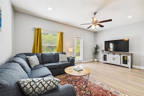 Living Room with sectional and tv