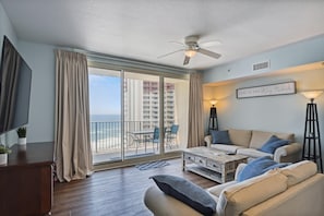 Living room with access to balcony and westward view of the Gulf!