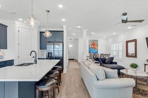 The cook can mingle with the rest of the guests in this open layout!