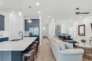 The cook can mingle with the rest of the guests in this open layout!