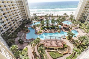 Balcony View of the famous lagoon pool at Shores of Panama and the beautiful gulf