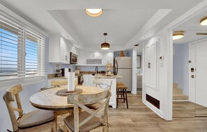 Dining table for 4
bar seating
full kitchen
