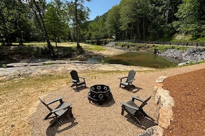 Take a short downhill walk to reach the wood-burning fire pit at the water's edge, where you can relax under the stars!