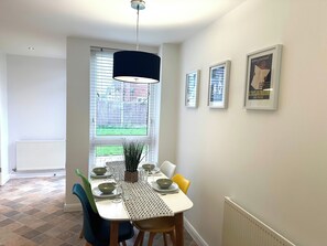 Dining room table and chairs, back garden access