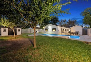Large yard with private heated pool