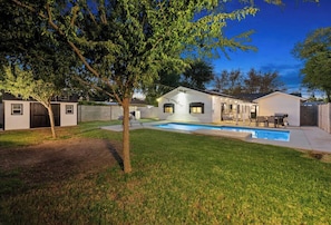 Large yard with private heated pool
