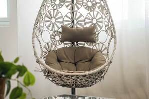 Egg chair in the living room is a fun place to sit.