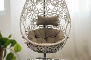 Egg chair in the living room is a fun place to sit.