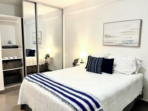 One of two bedroom with queen beds, AC, and lots of space for your clothing.