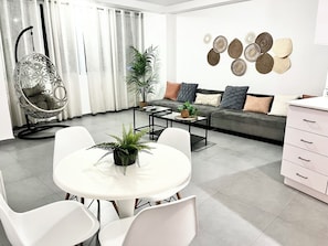 Open concept of the living room and kitchen makes it easy for everyone to chat.
