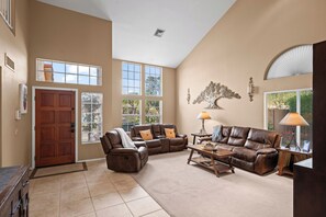 Relaxation made easy with cozy seating and a sleek modern aesthetic.