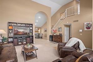 Kick back on plush leather couches and enjoy your favorite shows on the large TV.