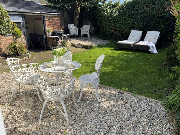 Private Back Garden with outdoor dinging and seating - A BBQ is available upon request - guest will need to supply there own coal etc