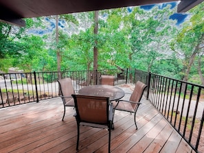 Soak in the sights and sounds of nature from this elevated outdoor space—deck living at its best!