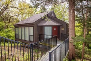 "Welcome to Treetop Villa 57! Your charming lakeside retreat nestled in the heart of the Treetop Village Ozarks."