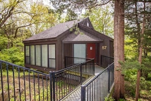 "Welcome to Treetop Villa 57! Your charming lakeside retreat nestled in the heart of the Treetop Village Ozarks."