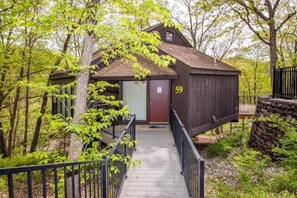 "Welcome to Treetop Village 59! Your charming lakeside retreat nestled in the heart of the Four Seasons Lake of the Ozarks."