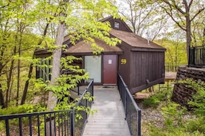 "Welcome to Treetop Village 59! Your charming lakeside retreat nestled in the heart of the Four Seasons Lake of the Ozarks."